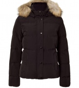 Withstand the cold, while remaining stylish, in this high quality quilted down jacket from outdoor outerwear experts Woolrich - Stand collar, raccoon fur-lined hood, snap front placket with concealed zip closure, long sleeves, zip pockets, quilted, snow and water resistant, slim fit - Perfect for a ski vacation or a chic winter-ready look