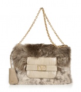 Take a runway favorite straight to your wardrobe with DVFs luxe shearling and snakeskin clutch, detailed with a polished metal logo for a covetable chic finish - Tonal snakeskin flap with front slot pocket and hidden magnetic closure, inside zippered back wall pocket, three front wall slot pockets, removable matte finish gold-toned chain strap, concealed lip-shaped mirror attached to strap - Wear with luxe outerwear and leather accessories, or dress down with favorite blazers and jeans