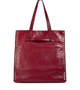 A rock n roll-inspired studded trim adds luxe-yet-edgy appeal to this supple leather tote from Valentino - Classic carryall shape, shoulder straps, studded trim, small internal pockets - Perfect for off-duty chic or early evening cocktails