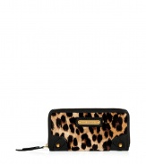 Inject an eye-catching edge into your statement accessories collection with Juicy Coutures bold leopard print zip-around wallet - Metal logo plaque, zippered back pocket, inside zippered coin pocket, bill and credit card slots - Stash away in oversized totes or carry alone for running quick errands