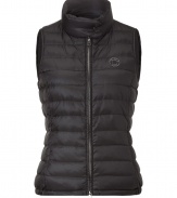 Lightweight and stylish, this quilted down Vest will keep you looking chic from season-to-season - Stand collar with snap detail, front zip closure, zip pockets, all-over quilt detail - Pair with jeans, wide leg trousers, or a mini-dress with ribbed tights