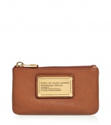 Add luxe style to the everyday with this leather key pouch from Marc by Marc Jacobs - Rectangular shape with round edges, top zip closure, front logo with gold-tone hardware, internal key ring detail, textured leather - Perfect for daily use or as a thoughtful gift