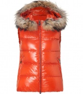 Stay warm while maintaining your impeccable style in this lightweight yet luxe down vest from Duvetica - Fur-lined hood, front two-way zip closure, sleeveless, zip pockets, quilted - Wear with an elevated jeans-and-tee ensemble and shearling lined boots