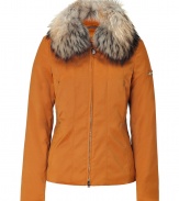 Your cold weather look just got more stylish with this luxe fitted down jacket from Peuterey - Large raccoon fur collar, front zip closure, slit pockets, slim fit, water repellent - Wear with an elevated jeans-and-tee ensemble or a workweek-chic look