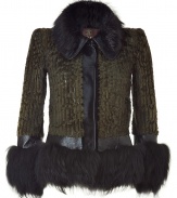 Slip into luxury in this fur jacket made of sheepskin and fox - Uncommon combination of soft, warm materials for a fashionable, fun piece that makes a statement - Features a slim, fitted silhouette with short cut, fur collar and large, decorative fur cuffs and hem - Upgrades any simple basic--try with skinny jeans, a silk blouse and heels