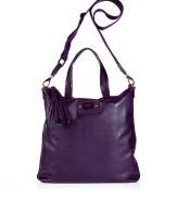 Elevate your everyday or off-duty look with this supple leather tote from cult-favorite accessory designer Anya Hindmarch - Large carryall shape, top zip closure with tassel detail, top carrying handles, convertible shoulder strap, small internal pockets, back zip pocket - Perfect for toting around your daily essentials, work, or stylish travel