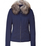 Your cold weather look just got more stylish with this luxe fitted down jacket from Peuterey - Large raccoon fur collar, front zip closure, slit pockets, slim fit, water repellent - Wear with an elevated jeans-and-tee ensemble or a workweek-chic look