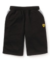 Classic cotton PUMA Bermuda shorts get a sporty kick with contrasting pocket details and the distinctive Ferrari logo.