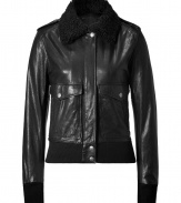 Super stylish black aviator bomber jacket from McQ Alexander McQueen - This feminine take on the classic leather bomber is sexy and on-trend - Modern slim and cropped fit with shearling collar and flap pockets - Wear with a mini-dress, opaque tights, and over-the-knee boots - Style with skinny jeans, a crop-top, and platforms