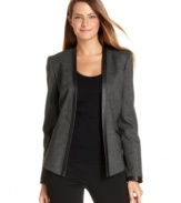 Calvin Klein's latest blazer features a minimalist aesthetic while still looking luxe, thanks to sleek styling and faux leather trim.