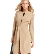 Calvin Klein creates a minimalist masterpiece with this collarless coat. The elongated hem makes it perfect for pairing with skirts and dresses, too.