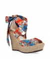 Stylish espadrille sandal in fine, multicolor silk viscose - Vibrant red and blue Ikat print ties snake around the ankles and knot at back - Beige silk upper and lining - 4.5 raffia wedge heel and 1.5 platform - Silk upper and sole - Bold and boho, adds an instant shot of 70s-inspired glamour to any ensemble - Pair with a gauzy short dress, a high waisted skirt and tank or a tunic top and shorts