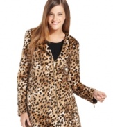 Finish your workweek look with this animal-print jacket from Calvin Klein.