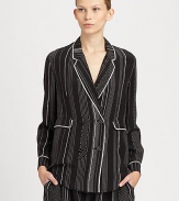 Pinstripes and a menswear-inspired fit recast the double-breasted jacket as a trend-smart silk pajama top. Notched lapelsButton frontLong sleevesFront flap pocketsAbout 26 from shoulder to hemSilkDry cleanImportedSIZE & FITModel shown is 5'10 (177cm) wearing US size 4. 