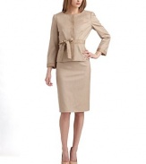 This structured piece with tonal topstitching and textured ribbon trim is at once feminine and versatile.Roundneck Long sleeves with topstitched texture-trimmed cuffs Concealed snap front placket with topstitched texture-trimmed cuffs Seam details, front and back Topstitched, textured self belt ties at the waist About 21 from shoulder to hem Fully lined 94% virgin wool/6% polyamide Dry clean Made in Italy