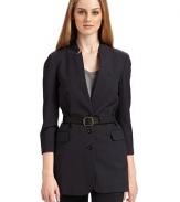 THE LOOKNotched collar Three button front ¾ sleeves with five button cuffs Single welt pocket at chest Leather belt with buckle and belt loopsTHE FITAbout 28 from shoulder to hemTHE MATERIAL96% wool/4% Lycra spandex Fully linedCARE & ORIGINDry clean Imported