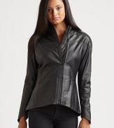 THE LOOKMock neckline Motocross quilted stitching at shoulders Off center front zipper Long sleeves with zip cuffs Princess seamsTHE FITAbout 23 from shoulder to hemTHE MATERIALLeather Silk liningCARE & ORIGINDry clean by a leather specialist Imported