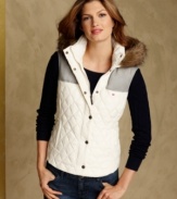 Tommy Hilfiger's cozy quilted vest is a layering essential. Pair it with a long-sleeve tee and jeans for weekend style made chic.