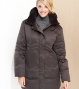 Cute zigzag quilting updates an essential plus size puffer coat from DKNY. A cozy hood provides extra protection from the elements.