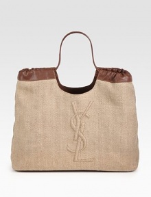 Woven straw tweed pairs with rich leather trim in this roomy carryall finished with YSL embroidery.Double top handles, 8½ dropProtective metal feetOne inside open pocketCotton lining17W X 10½H X 5DMade in Italy