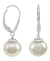 From the island of Mallorca, Spain, these drop earrings feature white round organic man-made pearl (10 mm) set in sterling silver. Approximate drop: 1 inch.