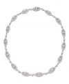 Opulent ovals. Eliot Danori's Oval Elegance necklace is exquisitely crafted with a dazzling array of crystals and cubic zirconias (1-7/8 ct. t.w.). Set in silver tone mixed metal, it will add sumptuous style to your evening ensemble. Approximate length: 16 inches.