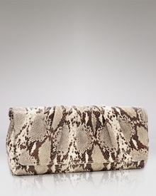 Python-embossed leather creates an unforgettably chic clutch. By Lauren Merkin.