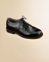 Constructed in the softest leather, this classic oxford is designed in a lace-up silhouette with intricate cut-out details.Lace-upLeather upperLeather liningRubber solePadded insoleImported