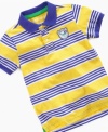 This classic polo by Greengdog has a cute dinosaur patch giving it preppy and playful style.