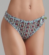 A printed thong with contrast printed trim and large bow accent at side, a playful style from Princesse Tam Tam.