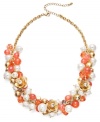 This season is all about color! Add the chic back into your style with Robert Rose's intricate cluster necklace. Crafted in gold-plated mixed metal with acrylic pearls and beads in white and coral hues. Approximate length: 18 inches + 3-inch extender.