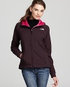 With light insulation and a silken fleece lining, this cozy The North Face® hoodie lends comfort from the cold.