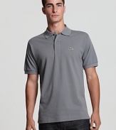 A clean-cut cotton polo with tonal embroidery at the left chest.