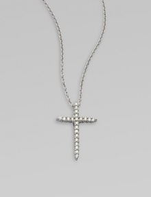 A beautiful cross that sparkles with diamonds in 18k gold on a chain link necklace. Diamonds, .1 tcw18k white goldLength, about 16 to 18 adjustablePendant size, about ½ Lobster clasp closureMade in Italy