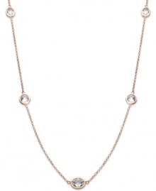 Layer yourself with inches of sparkle. This delicate necklace is crafted in 14k rose gold over sterling silver, with round-cut white topaz stations (4 ct. t.w.). Approximate length: 17 inches.