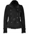 Timeless classic styling gets a chic urban remake in Burberry Londons jet black shearling jacket, tailored to perfection with an impeccable short cut - Fur collar, long sleeves, belted cuffs, double-breasted buttoned front, epaulettes, gun flap, rain shield, belted waistline, belt loops, tailored fit - Pair with edgy separates and contemporary color-pop footwear