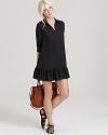 The menswear-inspired shirt dress gets a feminine makeover with this Rachel Zoe LBD featuring a pleated yoke, three-quarter sleeves and a ruffled hem. Sweet for spring with strappy flats, this go-everywhere style proves black is never boring.