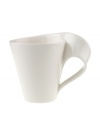 A hybrid of Asian-inspired style and modern details, the New Wave Caffé mug from Villeroy & Boch's dinnerware and dishes collection lends impromptu or informal gatherings sophistication. The unique, shape and warm, creamy glaze combine for a truly eye-catching effect. 12.5 oz capacity.