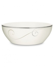 Fluid platinum scrolls glide freely throughout this beautiful fine china round vegetable bowl from Noritake. Easy to match with any decor, the fresh and elegant Platinum Wave collection of dinnerware and dishes is a timeless look for fine dining or luxurious everyday meals. Holds 96 oz.