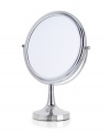 Don't miss a thing with this large-faced vanity mirror. A 360-degree revolving design offers both a regular and magnified view so you can perfect your look with ease. With a handsome chrome finish.