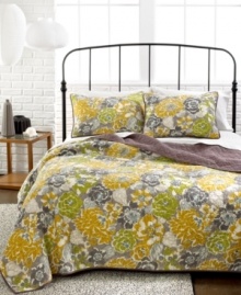 Embrace your wild side. Bold florals outfit the bedroom in modern style with this Mya quilt, boasting allover scalloped quilted details for plush dimension and a touch of finesse. Reverses to solid purple for a toned down look.