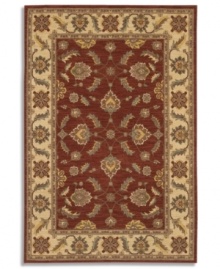 Covered in graceful floral imagery, this area rug will fill your room with color. The Sedona Henna rug is woven from New Zealand worsted wool that has been specially twisted and space-dyed to replicate the look of a hand-woven Peshawar rug. In deep red with a warm beige border, this magnificent piece creates an inviting space for gatherings in your home.