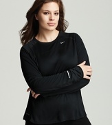 Worn alone for circuit training or layered over a tank on a long outdoor run, this Nike top will keep your workouts looking as good as they feel