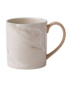 Less is more. Make a big statement with the minimalist shapes and marbled neutrals of this Nature's Canvas mug. Durable stoneware with turquoise trim and interior glaze boasts cool, modern appeal.