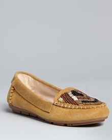 House of Harlow 1960 takes its vintage styling into updated, of-the-moment moccasin loafer flats.