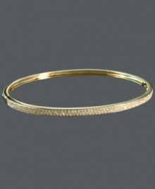 Sweet, stackable sparkle. Trio by Effy Collection's subtly shimmering bangle features dozens of round-cut diamonds (5/8 ct. t.w.) set in 14k gold. Wear this style alone or pair it with other bangles for an ultra-chic layered look. Approximate diameter: 2-3/8 inches.