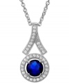 Layer your neckline with glittering color. This pendant necklace by CRISLU features multiple clear cubic zirconias accented by a sapphire-colored cubic zirconia (1-1/5 ct. t.w.). Set in platinum over sterling silver. Approximate length: 16 inches + 2-inch extender. Approximate drop: 4/5 inch.