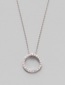 From the Tiny Treasures Collection. A simple circle shimmers and sparkles, outlined in diamonds and dangling from a chain of 18k white gold. Diamonds, 0.10 tcw 18k white gold Chain length, about 16 Pendant diameter, about ½ Lobster clasp Made in Italy