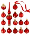 Stick to a theme of true elegance with burgundy-red Christmas ornaments from Kurt Adler. Glass with a matte or shiny finish is striped and spotted with gold glitter for a tree that's entirely timeless.