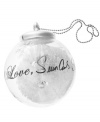 With love from Sean John. Have a very hip-hop holiday with this snow-filled ornament featuring the designer's signature and a silvertone bead chain. (Clearance)